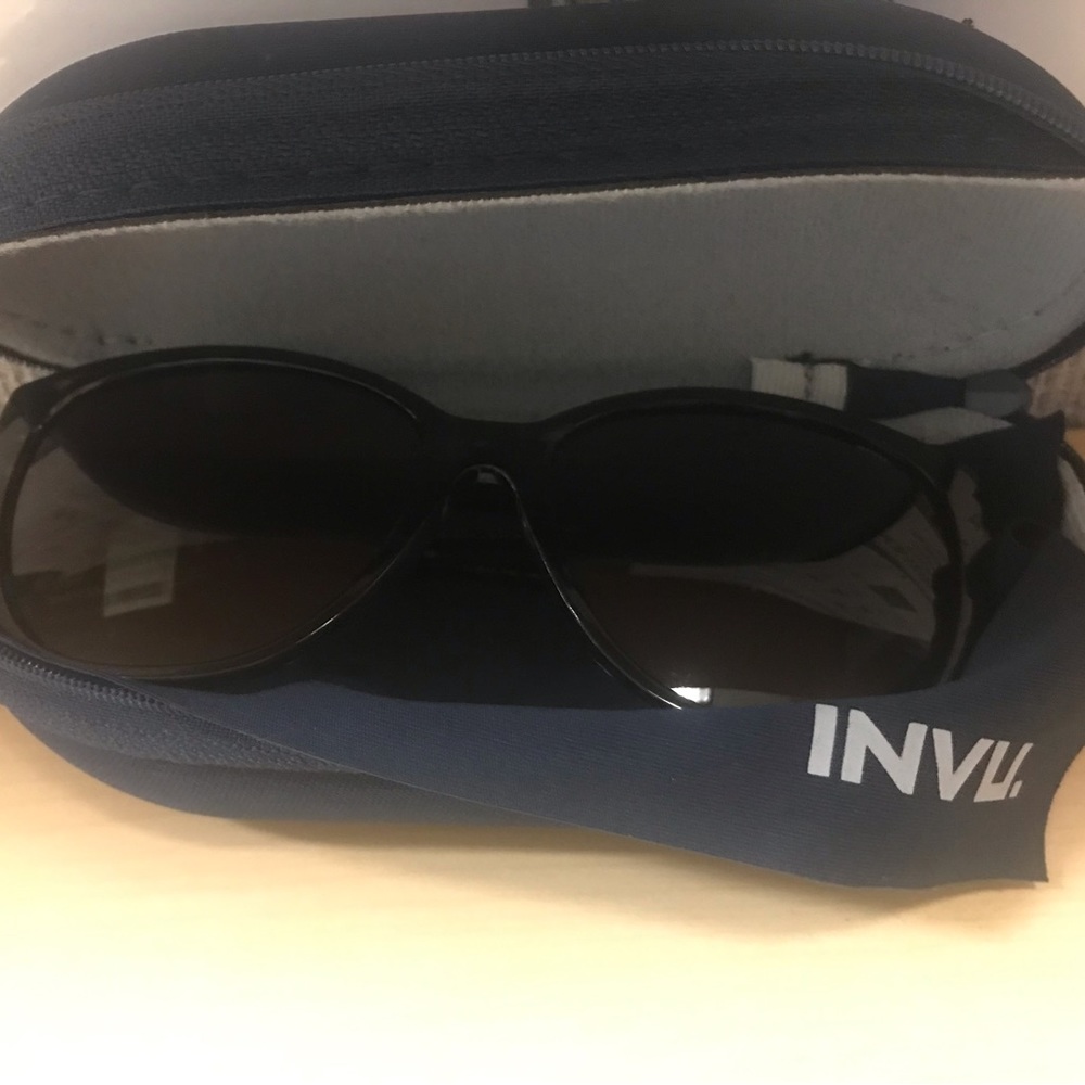 INVU-222 polarized sunglasses. Brand new. Never worn. Case included.